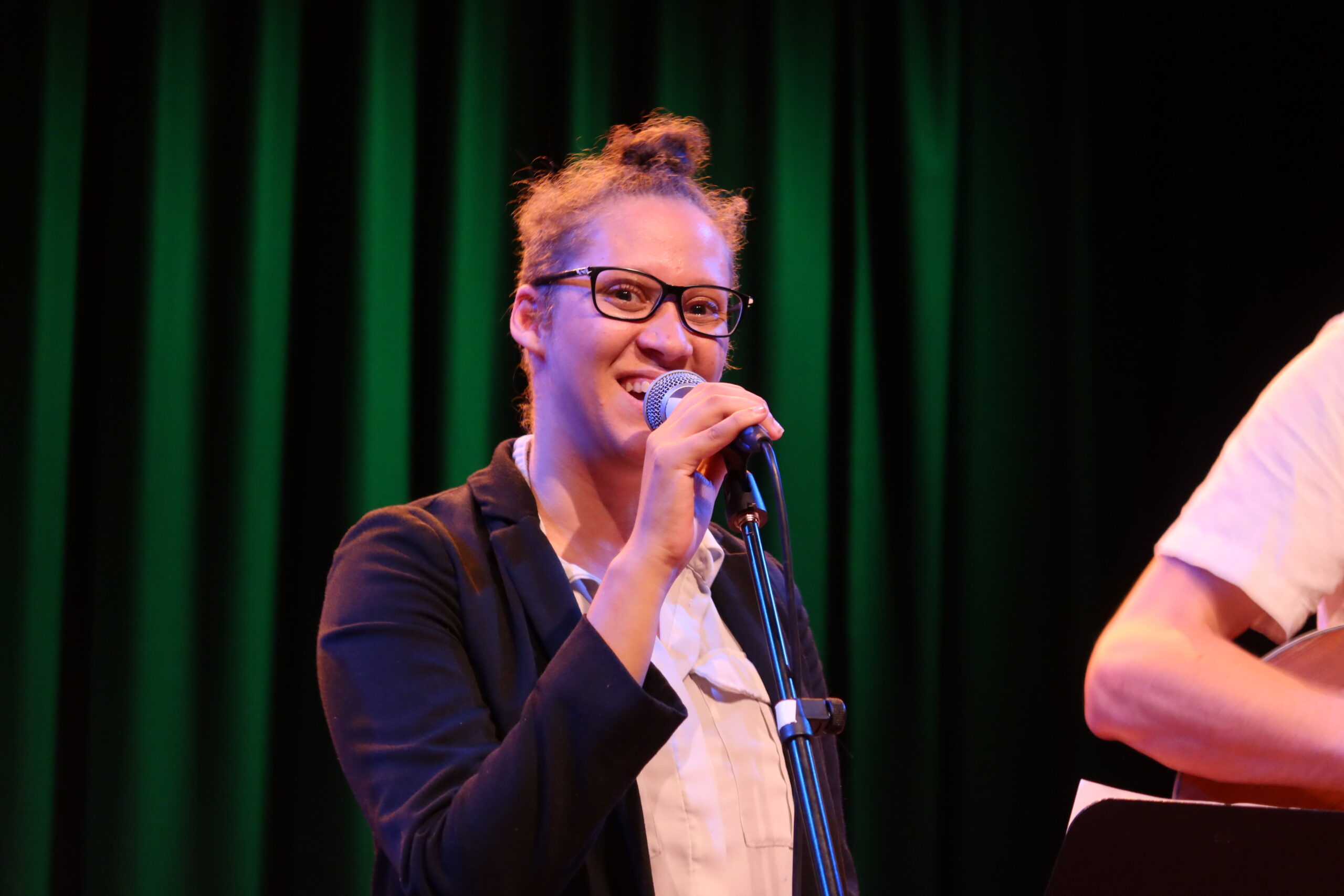 A young musician singing a human rights song